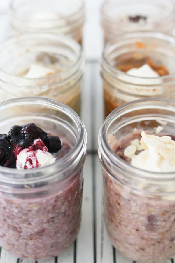 6 mason jar steel cut oats with different fillings and toppings