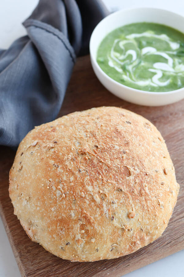 Instant Pot Whole Wheat Crusty Bread is full of seeds and whole grains and the perfect side to a great bowl of soup