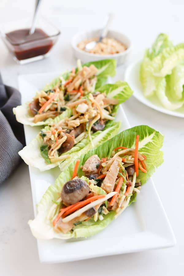 Pressure Cooker Easy Moo Shu Pork served on lettuce wraps with dipping sauce