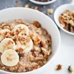Close up of banana bread steel cut oats in a white bowl