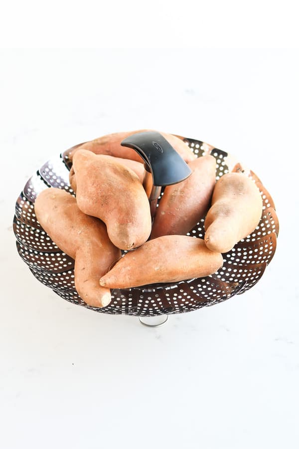 Instant Pot Sweet Potatoes on a steamer basket