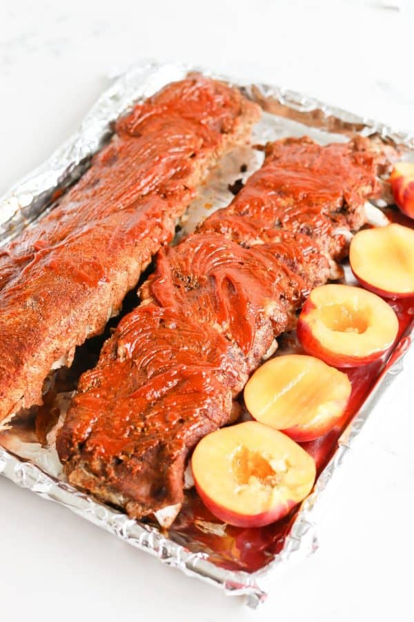 Instant Pot Chipotle Peach BBQ Ribs on a pan