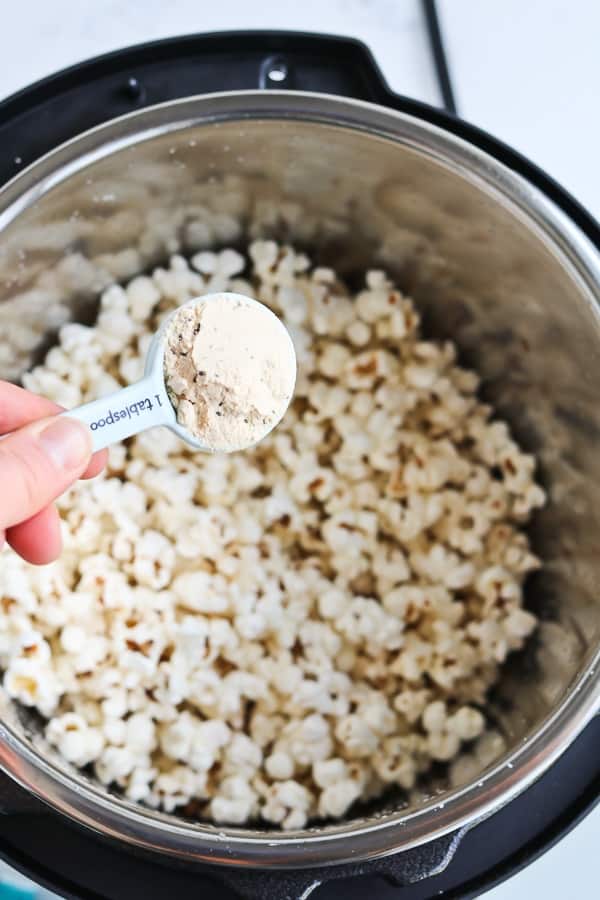 Instant Pot Popcorn in a silver pot