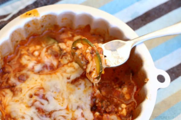 cheesy zucchini lasagna in a white pan