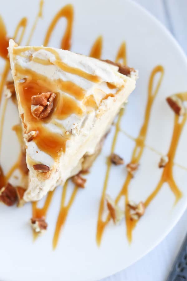 caramel apple cheesecake on a white plate