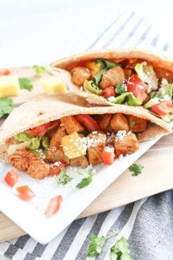 Pita filled with pork tenderloin and pineapple