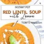 red lentil soup in a white bowl with cream and basil