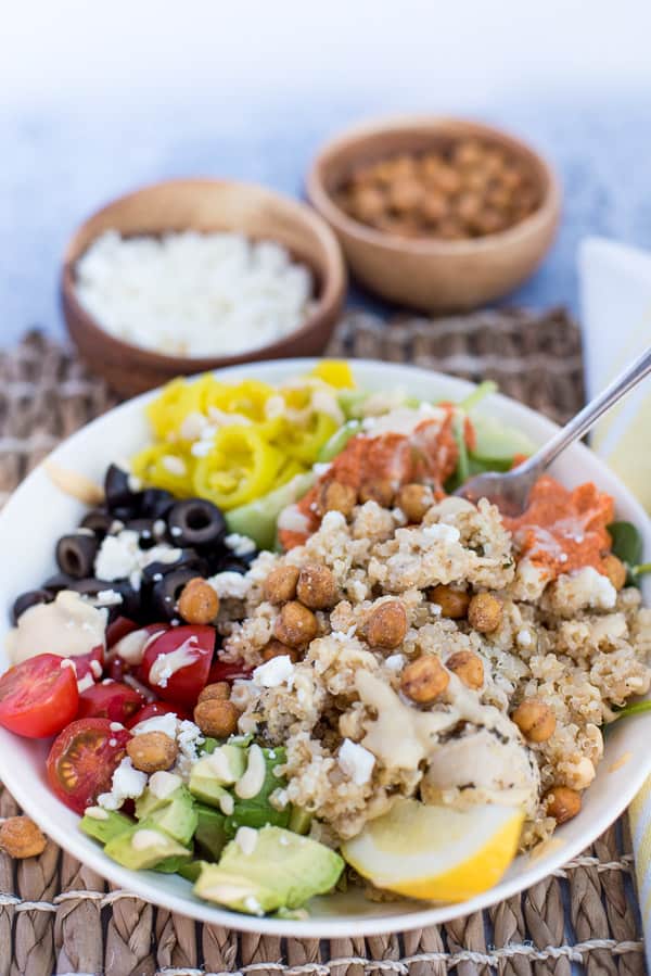 Instant pot Quinoa bowl with chicken, tomatoes, olive, peppers with hummus dressing