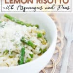 Instant Pot Lemon Risotto with Asparagus and Peas in a white bowl with a fork and lemon slices