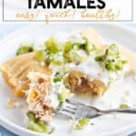 Instant Pot Tamaleson a white plate with a fork
