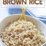 Instant Pot Brown Rice in a white bowl with chopsticks
