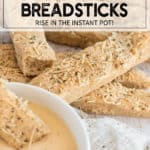 whole wheat breadsticks with parmesan and herbs with a bowl of soup
