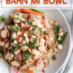 Instant Pot Bahn Mi in a white bowl with carrots and cilantro and peanuts