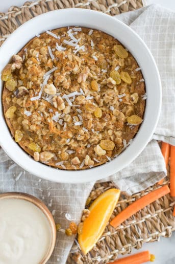 Instant Pot Carrot Cake Oatmeal with carrot sticks and orange slices