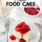 two slices of angel food cake on a white plate with strawberries