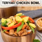 wood bowl with teriyaki chicken, rice, and vegetables
