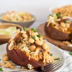Instant Pot Coconut Chicken Stuffed Sweet Potato with Tangy Slaw and Peanut Sauce