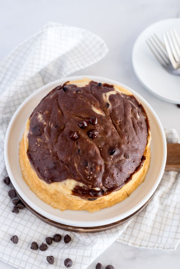chocolate swirl breakfast cake on a white plate