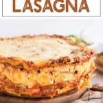 cheesy lasagna on a wood cutting board